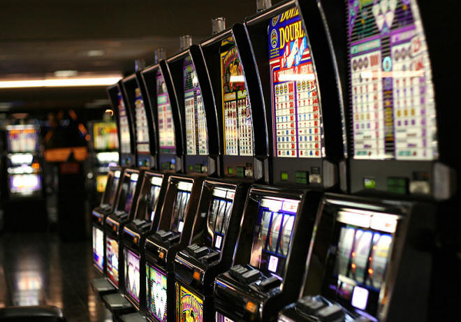 Row of slot machines inside Las Vegas airport.